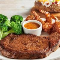 12oz Ribeye* & Choice of Shrimp · Our 12 oz. hand-cut ribeye with Grilled Shrimp on the Barbie or Coconut Shrimp. Served with ...