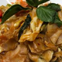 Drunken Noodle · Spicy flat rice noodles, garlic and chili sauce, tomatoes, onion, bell pepper and basil leav...