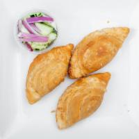 Curry Puffs · Our Thai style crispy pie made with mash potatoes and carrots in yellow curry paste served w...