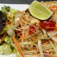 Somtum · Thai Style salad with fresh green papaya, carrots, cheery tomatoes, toasted crunchy peanut i...