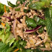 Larb Gai · Thai-Northeastern style salad with minced chicken in chili and lime dressing, rice powder, r...