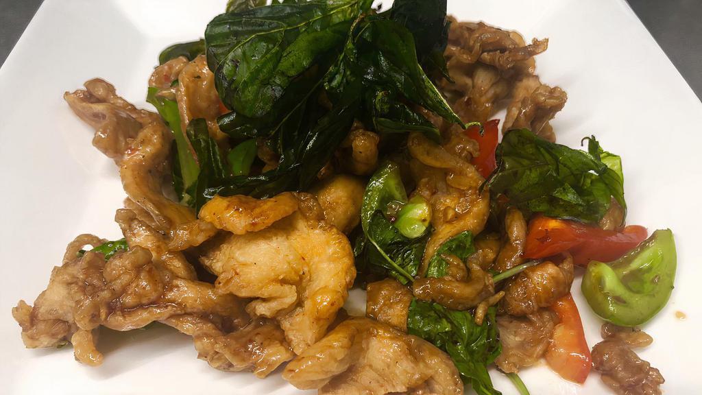 Crispy Chicken & Basil · Our signature crispy chicken sautéed with house special Thai chili and basil sauce.