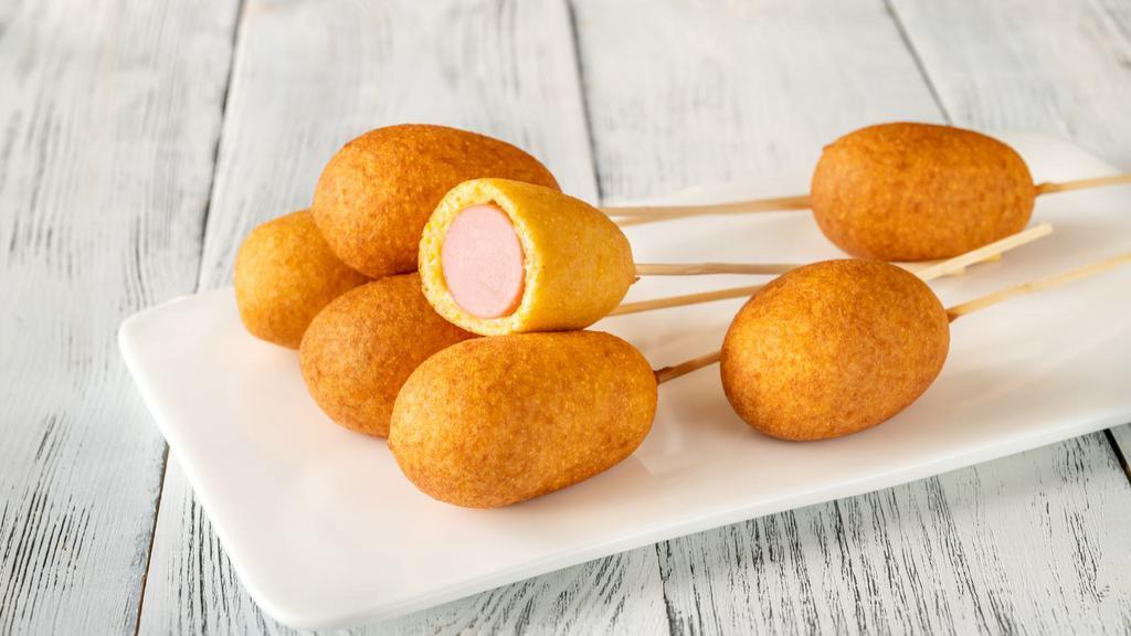 Corn Dog · Delicious beef dog battered and fried to perfection.