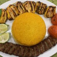Chicken + Kubideh with Basmati Rice · Combination of one kubideh kabob and one boneless chicken kabob. Served with grilled tomato ...