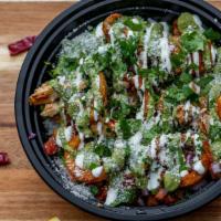 Chicken Street Bowl · Marinated chicken, cilantro lime rice, house-made guacamole, fresh pico de gallo, tater tots...