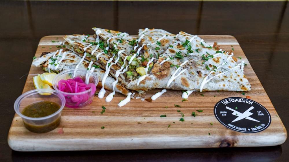 Quesadilla · Comes with a side of chips, salsa and pickled red onions.
Make it ABVE style with chipotle aioli and sour cream drizzle