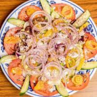 Greek Salad · Lettuce, Onions, Tomatoes, Cucumbers, Olives, Banana Peppers and Cheese. Add Chicken and Gyr...