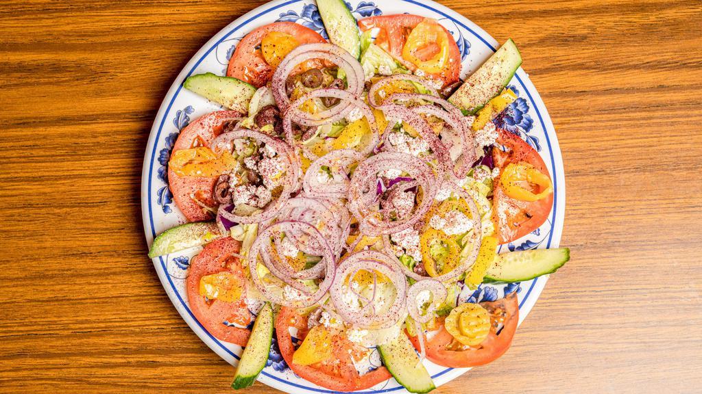 Greek Salad · Lettuce, Onions, Tomatoes, Cucumbers, Olives, Banana Peppers and Cheese. Add Chicken and Gyro for Additional Charges.