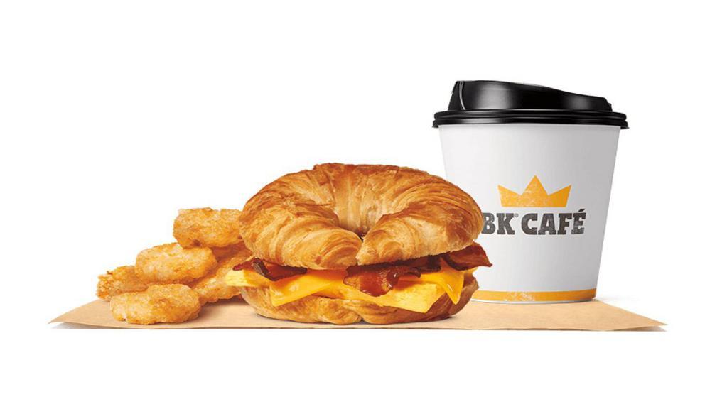 Bacon, Egg & Cheese Croissan Wich® Meal · Our grab-and-go Bacon, Egg & Cheese CROISSAN’WICH® is now made with 100% butter for a soft, flaky croissant piled high with smoked bacon, eggs, and melted cheese. Meal comes in medium and large sizes. Served with Hash Browns, your choice of Drink.