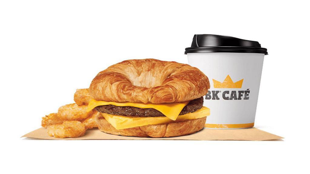 Sausage, Egg & Cheese Croissan Wich® Meal · Our grab-and-go Sausage, Egg & Cheese CROISSAN’WICH®is made with 100% butter for a soft croissant piled high with savory sausage, fluffy eggs, and melted cheese. Meal comes in medium and large sizes. Served with Hash Browns, your choice of Drink.