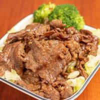 Teriyaki Beef Rice Bowl · BBQ Beef with homemade teriyaki sauce on top of rice and veggies