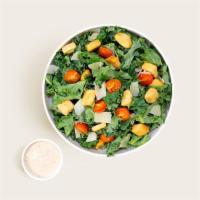 Spinach Caesar · Spinach with fresh Parmesan, croutons, chopped tomatoes, and Caesar dressing.