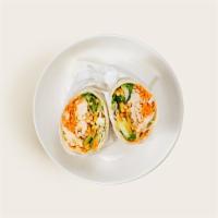Asian Chicken Wrap · Grilled sliced chicken with shredded carrots, chopped romaine, and an Asian sesame vinaigret...