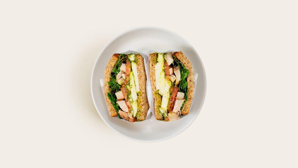 Chicken Pesto Sandwich · Grilled sliced chicken with mixed greens, tomato, fresh mozzarella, and pesto on your choice of bread.