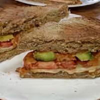 Turkey Avocado Melt Sandwich · Sliced turkey with avocado, tomato, and melted mozzarella on your choice of bread.
