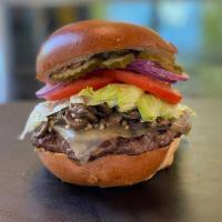 Mushroom Swiss Burger · Our fresh ground hand pressed 7 ozs. of choice chuck hamburger topped with garlic mushrooms,...