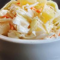 Pineapple Coleslaw · A tangy and sweet coleslaw with pineapple tidbits.
