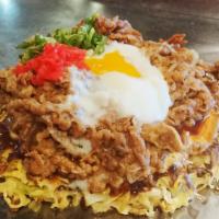 Gyusuki Okonomiyaki · Stewed beef and fried egg on top of okonomiyaki topped with pickled ginger. U.S. Only!