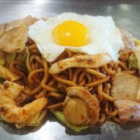 Deluxe Yakisoba · All-in stir fried noodles with pork, squid, shrimp, scallops and cabbage topped with fried egg