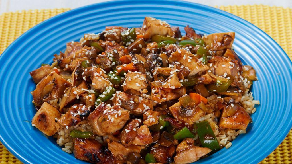 Teriyaki Grilled Chicken Stir-fry · Grilled chicken breast, portabella mushrooms, onions, peppers, carrots and sesame seeds in a rich teriyaki sauce over brown rice.