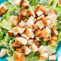 Chicken Caesar Salad · Chicken,Parmesan Cheese and zero carb caesar dressing on a power blend of romaine spinach