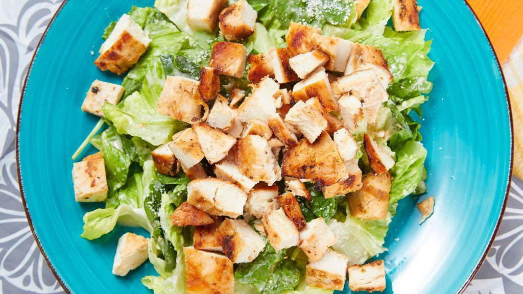 Chicken Caesar Salad · Gluten-free. Chicken, parmesan cheese, and zero carb Caesar dressing on a power blend of romaine, spinach, and baby kale.