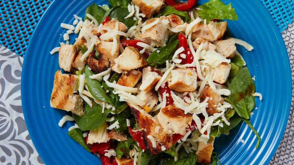 Italiano Salad · Chicken breast, part skim mozzarella, roasted red peppers, fat free balsamic vinaigrette on a power blend of romaine, spinach and baby kale. (GF)