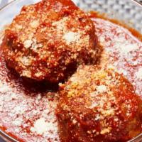 Turkey Meatballs · With marinara topped with parmesan cheese.