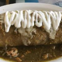 Burrito de Chile Verde · Pork cooked in a spicy green sauce with whole beans and rice.