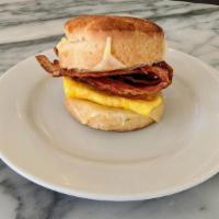 Bacon, Egg, & Cheese Biscuit · Housemade buttermilk biscuit sandwich with 1 scrambled egg, Hobb's bacon, and melted cheddar.
