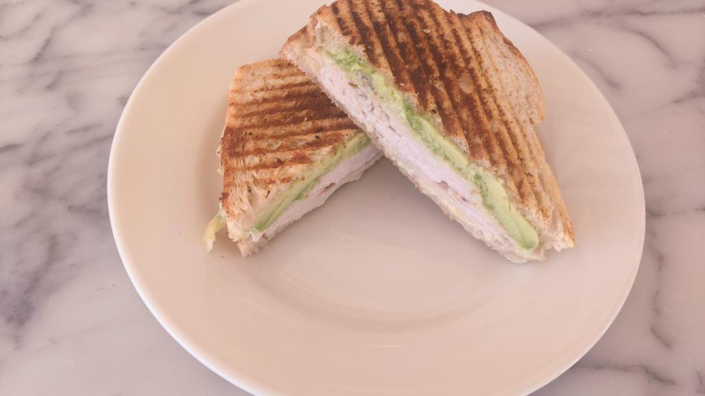 Grilled Turkey Sandwich · Hobbs' turkey, gruyere cheese, herb mayo and avocado on acme sour loaf