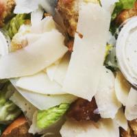 Caesar Salad · Romaine lettuce, parmesan cheese, caesar dressing (contains anchovy) and croutons