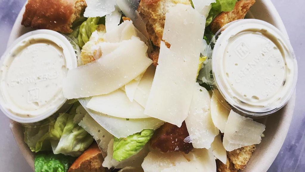 Caesar Salad · Romaine lettuce, parmesan cheese, caesar dressing (contains anchovy) and croutons