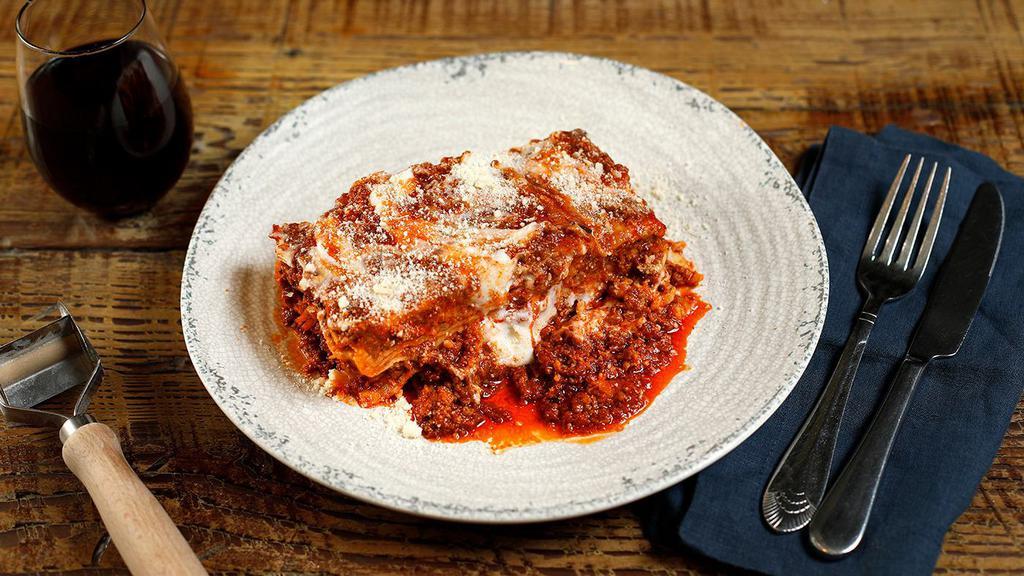 Meat Lasagna · Meat lasagna, with beef and pork bolognese sauce and bechamel sauce.