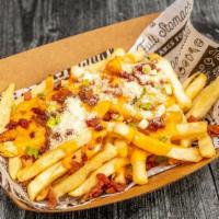 Fries Deluxe · French fries with cheese and bacon.