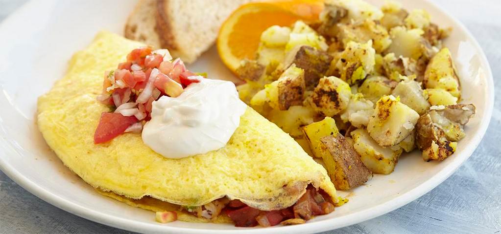 Salsa Omelette · Avocado, bell peppers, onions, tomatoes, Cheddar and Jack cheese topped with sour cream and salsa.