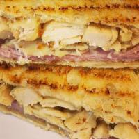 Chicken Panini · Halal grilled chicken breast, cheddar cheese, pesto, tomato, onions, lettuce, mayo and musta...
