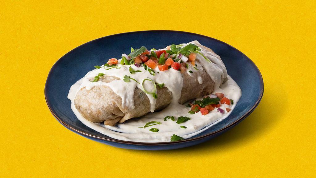 White Burrito Burracho · Burrito with your choice of meat, rice, beans, lettuce, and pico de gallo, topped with melty cheese sauce