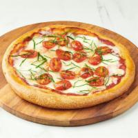 Pizza Bruschetta · Ciliegine fresh Mozzarella, grape tomato, with sweet and savory pizza sauce garnished with c...