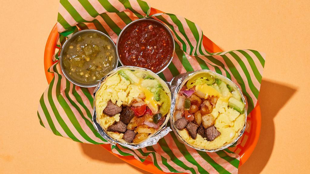 Build Your Own Breakfast Burrito · Build your own breakfast burrito with two scrambled eggs, crispy home fries, and your choice of protein and toppings.