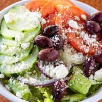 Greek Salad · Hearts of romaine, diced tomato, kalamata olives, cucumber, red onion, and feta cheese with ...