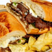 Philly Cheese Steak Sandwich · Fully loaded bread with philly steak melted with mozzarella, onions, green peppers, and mush...