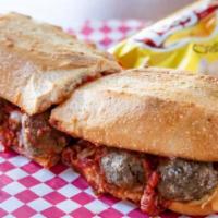 Meatball Parmesan Sandwich · Homemade marinara sauce, meatballs, Parmesan, and melted mozzarella cheese. Made on a french...