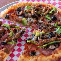Combination Specialty Pizza · Salami, pepperoni, ham, mushrooms, olives, bell peppers, Italian sausage.