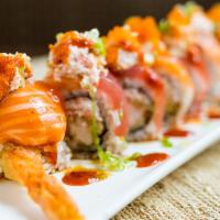 #1 Roll · shrimp tempura snow crab inside with salmon, tuna, and snow crab on top served with unagi sa...