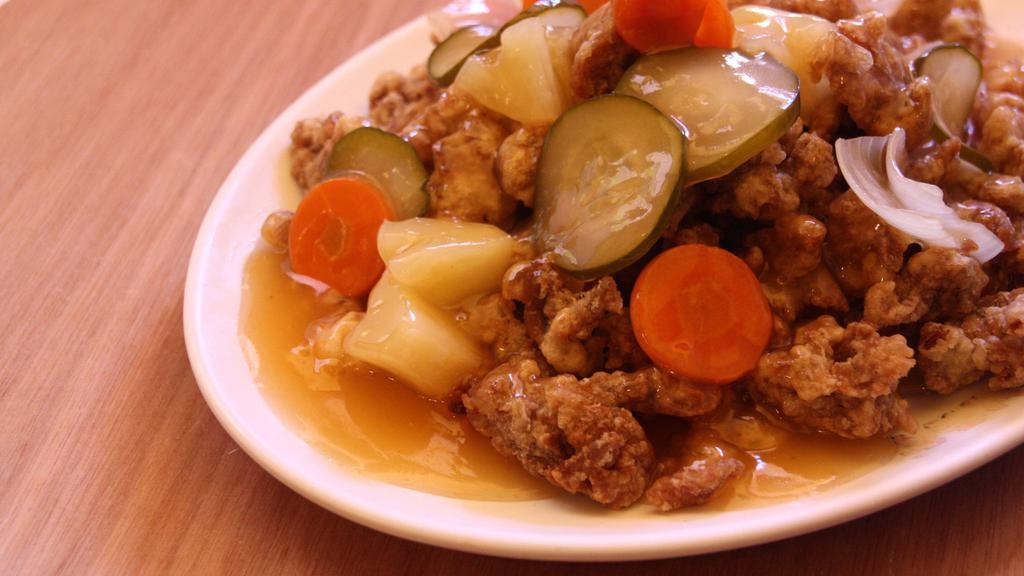 Tong Su Yook (Pork) | 탕수육 · Deep-fried battered pork in sweet and sour sauce with vegetables.