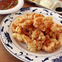 Gan Poong Shrimp | 새우깐풍기 · Deep-fried battered boneless and skinless shrimp served with sweet chili sauce on the side.