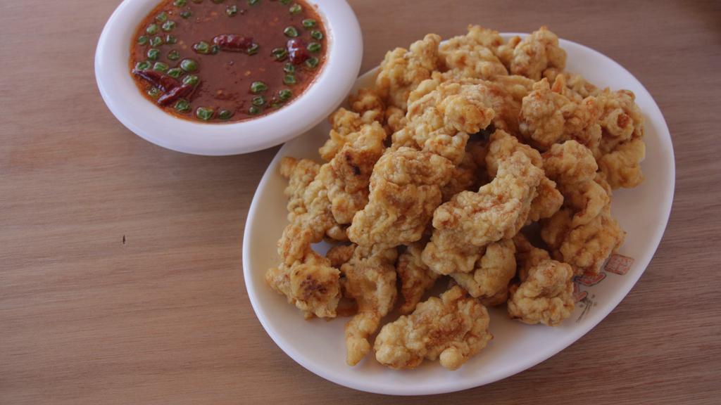 Popcorn Chicken (Gan Poong Ki) | 깐풍기 · Deep-fried battered boneless and skinless chicken served with sweet chili sauce on the side.