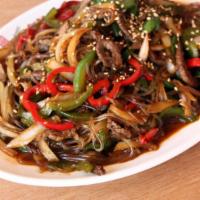 Go Choo Jap Chae with Beef | 고추잡채 · Stir-fried clear yam noodles with beef, bell peppers, and onions.