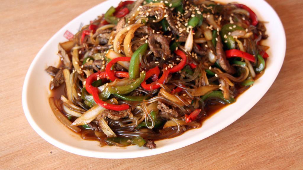 Go Choo Jap Chae with Beef | 고추잡채 · Stir-fried clear yam noodles with beef, bell peppers, and onions.